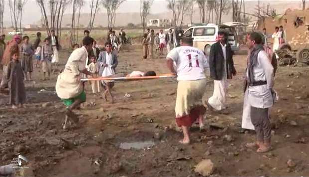 Rescue workers take the injured from the scene of airstrike. Picture courtesy: Yemen Press