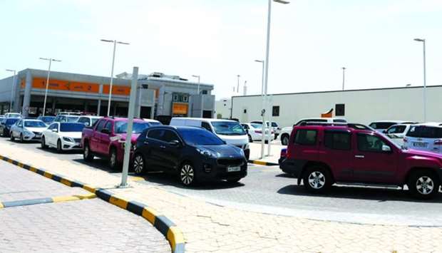 A long queue of vehicles at the Mesaimeer Fahes centre Monday. PICTURE: Shemeer Rasheed
