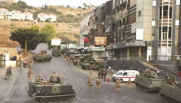 Lebanese army are deployed in the area, after an ambush on mourners, in Khaldeh, yesterday.