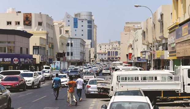 A busy commercial street in Doha. PICTURE: Shaji Kayamkulam.