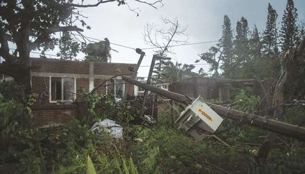 A view of a construction damaged by the landfall of Hurricane Grace in Tecolutla yesterday. (AFP)