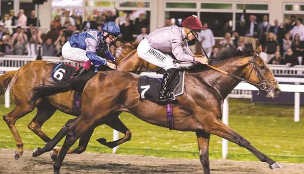 Thore Hammer Hansen (right) rides Lafan to victory in the Full Works Handicap in Chelmsford, England, on Saturday. (Megan Rose)