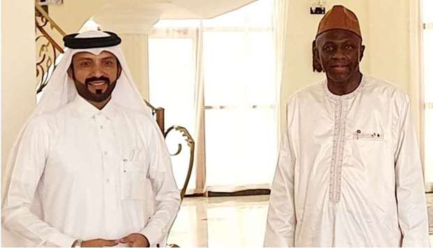 Toure and al-Sayed after holding a meeting at the Republic of Guinea's embassy in Qatar.