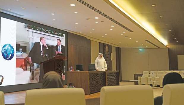 Qatar Tourism employees at the training session.