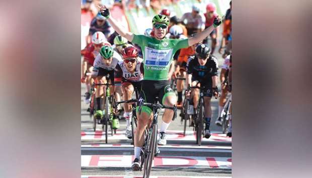 Team Deceunincku2019s Dutch rider Fabio Jakobsen celebrates as he wins the 16th stage of the La Vuelta in Santa Cruz de Bezana, Spain, yesterday. (AFP)