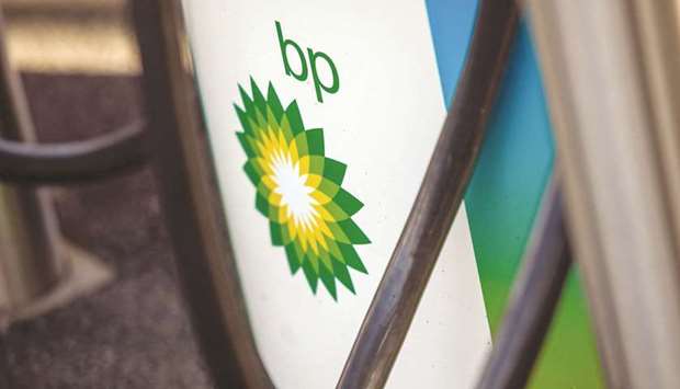 The BP company logo on an electric vehicle charging point in Milton Keynes, UK. BP will increase its dividend by 4% to 5.46 cents a share and buy back $1.4bn of stock in the third quarter, said chief executive officer Bernard Looney.
