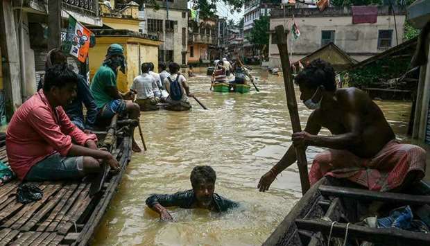 Flooding in West Bengal has displaced a quarter of a million people and killed over two dozen people. (AFP)