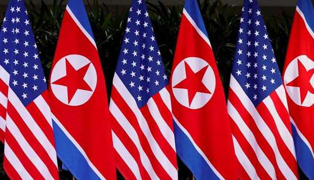 (File photo) US and North Korean national flags are seen at the Capella Hotel on Sentosa island in Singapore. (REUTERS)