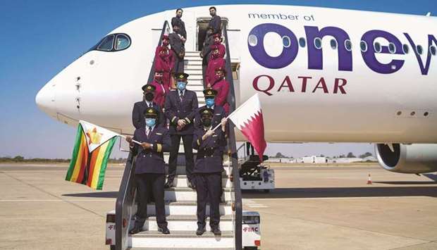 Qatar Airways crew marks arrival at Harare on Friday.