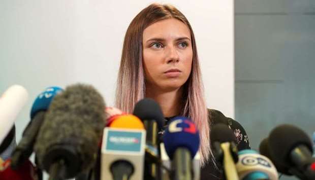 Belarusian sprinter Krystsina Tsimanouskaya, who left the Olympic Games in Tokyo and seeks asylum in Poland, attends a news conference in Warsaw, Poland Thursday. REUTERS