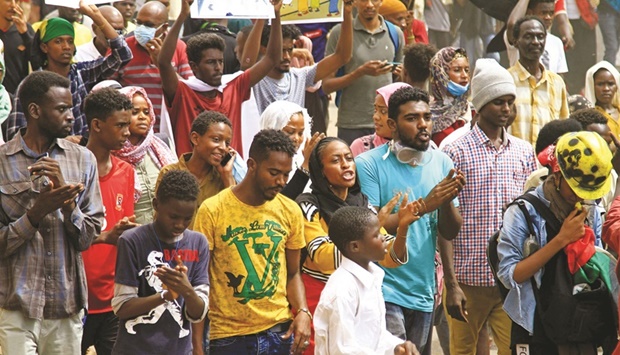 Sudanese protesters rally at the Bashadar station, south of the capital Khartoum, yesterday, against last yearu2019s military coup and a recent spike in tribal violence.