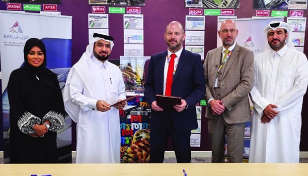 QRCS CEO Faisal Mohamed al-Emadi and RKH Qitarat deputy managing director Leonard Baldwin are seen with other officials at the signing ceremony