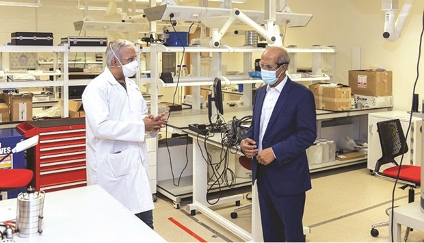 WIPO deputy director general ambassador Hasan Kleib (right) during a tour of the HBKU Research Complex.