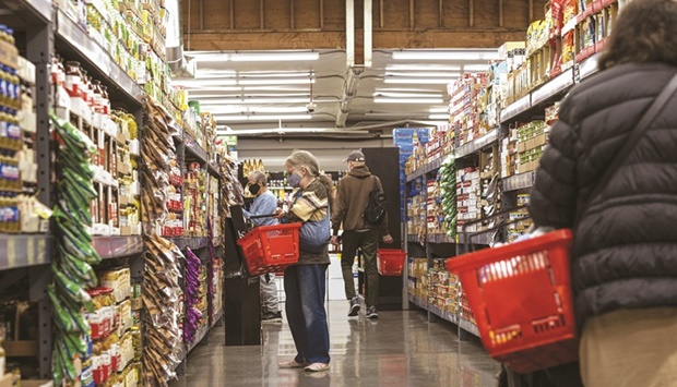 Shoppers inside a grocery store in San Francisco. US import prices fell for the first time in seven months in July, helped by a strong dollar and lower fuel and non-fuel costs, while consumersu2019 one-year inflation outlook ebbed in August, the latest signs that price pressures may have peaked.
