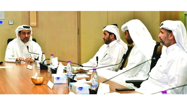 HE the Minister of Environment and Climate Change Sheikh Dr Faleh bin Nasser bin Ahmed bin Ali al-Thani (right) with QU president Dr Hassan Rashid al-Derham and other officials.
