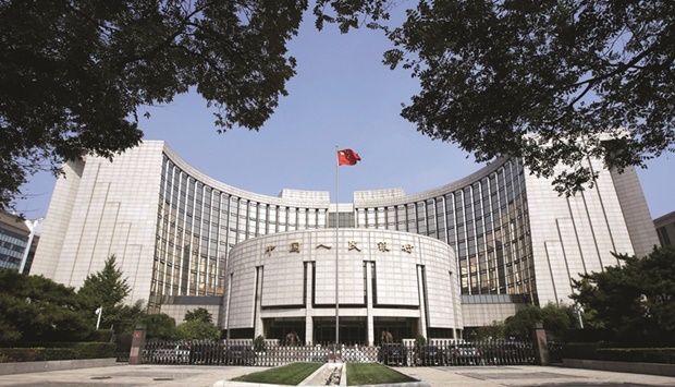 The headquarters of the Peopleu2019s Bank of China (PBoC), the central bank, is pictured in Beijing. Chinau2019s economy narrowly escaped a contraction in the June quarter, hobbled by the lockdown of the commercial hub of Shanghai, a deepening downturn in the property market and persistently soft consumer spending.