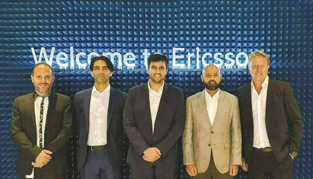 Ooredoo and Ericsson executives during the tour.