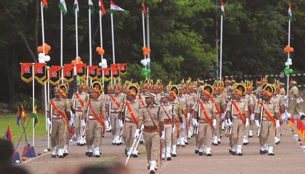 Indian Railway Protection Force (RPF) personnel march during a ceremony to celebrate countryu2019s 75th Independence Day at the railway sports complex ground in Hyderabad yesterday.
