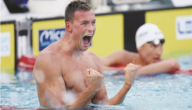Ukraineu2019s Mykhailo Romanchuk reacts after winning the menu2019s 1500m freestyle final at the European Aquatics Championships in Rome, Italy, yesterday. (Reuters)