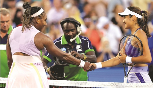 Serena Williams (left) congratulates Emma Raducanu after their Cincinnati Open match. (AFP)