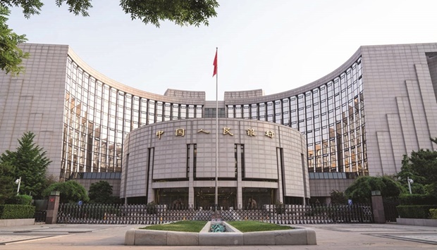 The Peopleu2019s Bank of China headquarters building in Beijing. Chinese banks will likely trim their benchmark loan prime rates on Monday for the first time in months to help spur borrowing demand and reverse a sharp slump in consumer and business sentiment.