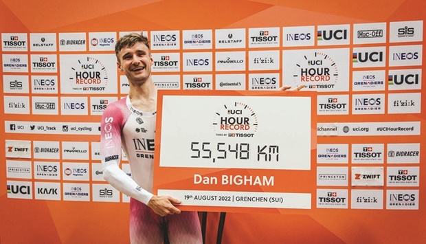 Britainu2019s Dan Bigham celebrates posting the new Hour record after he completed a distance of 55.548kms in Grenchen, Switzerland, yesterday.