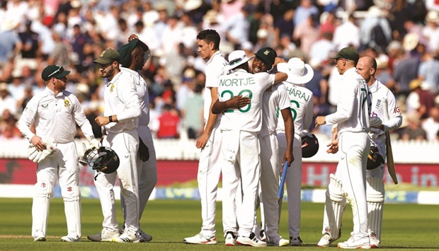 South Africau2019s players celebrate after winning the first Test against England on the third day at Lordu2019s yesterday. (Reuters)