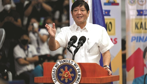Philippine President Ferdinand Marcos Jr delivers a speech during his visit to a vaccination site in Manila yesterday.
