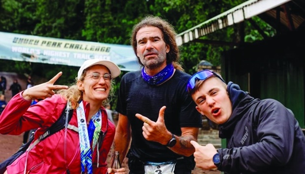 Winners: From left, Tamina Vogel (half marathon winner); Alexander Scherz (marathon winner) and Harvey Mitchell-Divers (half marathon winner)
