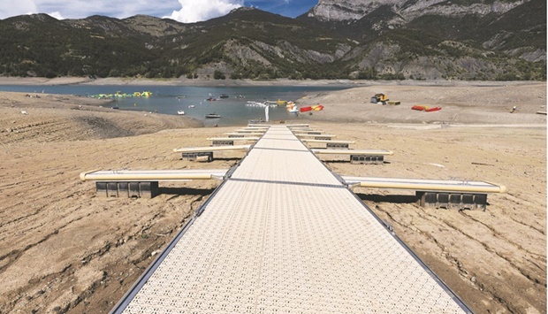 Boarding pontoons on lake Serre-Poncon in Ubaye Serre-Poncon in the French Alps are seen as the water level decreased due to the drought.