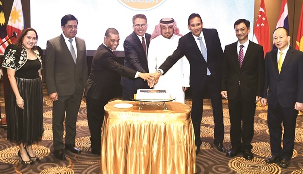 ACD chair Shamzari Shaharan and ambassador Ibrahim Yousif Abdullah Fakhro, along with Asean ambassadors, led the cake-cutting ceremony on Tuesday to mark the 55th Asean Day in Qatar, held at Holiday Villa Hotel & Residence Doha. PICTURE: Shameer Rasheed