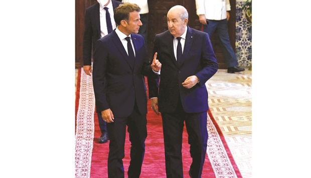 French President Emmanuel Macron attends a banquet hosted by Algeriau2019s President Abdelmadjid Tebboune at the presidential palace in Algiers yesterday.