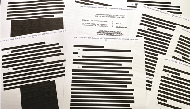 Pages of entirely redacted information are seen in the released version of an affidavit from the US Justice Department that was submitted to a federal judge to support the execution of a search warrant by the FBI at former president Donald Trumpu2019s Mar-a-Lago estate.