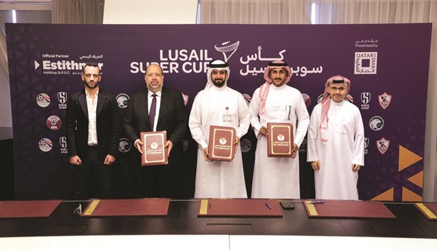 Officials pose after signing an agreement for Lusail Super Cup in Riyadh on Monday.