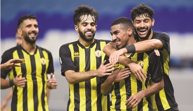 Qatar SCu2019s Abdulrahman al-Jassem (second right) celebrates with teammates after scoring against Al Shamal in the QNB Stars League at the Al Janoub Stadium on Monday. PICTURE: Noushad Thekkayil