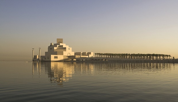 The Museum of Islamic Art appears to float above the waters of the Arabian Gulf.
