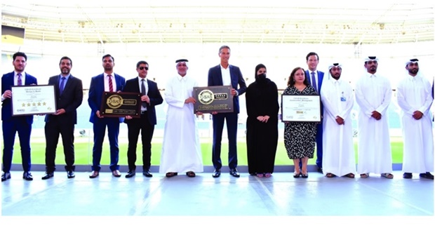 Officials with the certificates at Stadium 974 on Wednesday. PICTURE: Thajudheen.