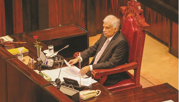 Sri Lankan President Ranil Wickremesinghe speaks at the parliament session in Colombo yesterday.