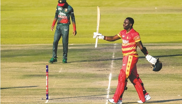 Zimbabweu2019s Innocent Kaia celebrates after scoring a century during the first ODI against Bangladesh in Harare yesterday. (AFP)