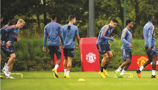 Manchester Unitedu2019s Cristiano Ronaldo (third right) trains with teammates yesterday ahead of the Premier League match against Brighton.