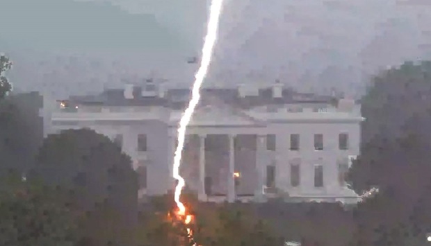 Lightning strikes a tree in Lafayette Park, across from the White House, killing two people and injuring two others, during a thunderstorm as seen in this framegrab from a Reuters TV video camera mounted on a nearby rooftop.