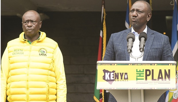 Deputy President and presidential candidate William Ruto (right) of Kenya Kwanza (Kenya first) political party coalition and his running mate Rigathi Gachagua speak to journalists at his official Karen residence in Nairobi. Kenyau2019s Deputy President William Ruto has blamed the state for circulating hate leaflets and alleged government workers were being used to plan for violence ahead of next weeku2019s general elections.