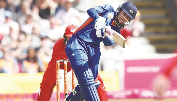 Indiau2019s Smriti Mandhana hits a four during the womenu2019s Twenty20 semi-final against  England on day nine of the Commonwealth Games in Birmingham yesterday. (AFP)
