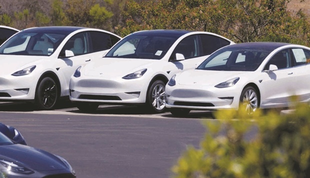Tesla electric vehicles are seen at a sales and service centre in Vista, California.