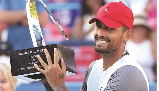 Nick Kyrgios of Australia celebrates with the Donald Dell Trophy after defeating Yoshihito Nishioka of Japan in the Citi Open final at the Rock Creek Tennis Centre in Washington, DC. (AFP)