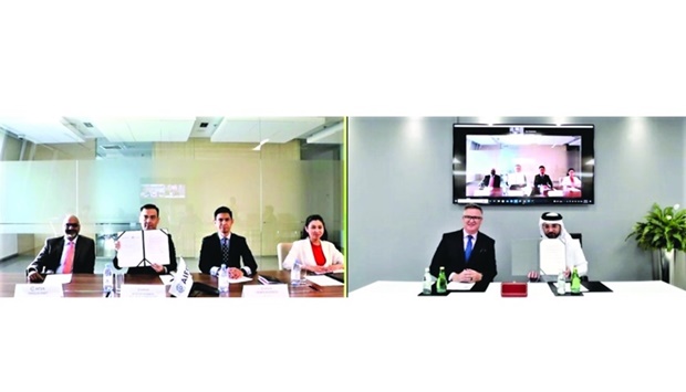 From left: Nurzhan Kosbayev, deputy chairman of AIFC Authority; Nasser al-Taweel, deputy chief executive and chief legal officer, QFC, and other senior team members at the MoU signing event.