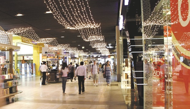 People shop at Dubai Mall (file). In a sign of improving business conditions in the non-oil private sector, S&P Purchasing Managersu2019 Index for Dubai rose to 56.4 last month from 56.1 in June. Itu2019s been above the 50-mark separating growth from contraction since late 2020.