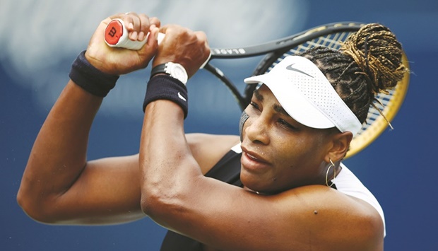 Serena Williams of the US plays a shot against Nuria Parrizas Diaz of Spain during the Toronto Open on Monday. (AFP)