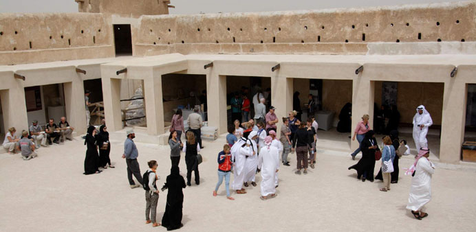  Visitors touring the Al Zubarah fort.