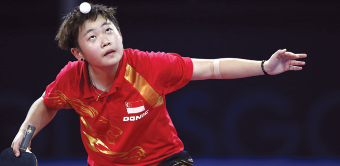 Ye Lin of Singapore serves during her match against compartiot Feng Tianwei in the semi-finals at the 2014 Commonwealth Games in Glasgow.  Lin lost. (
